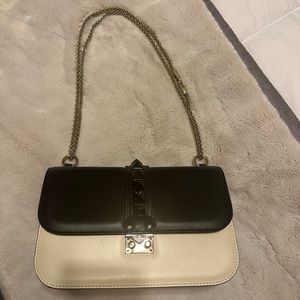 Valentino medium lock shoulder bag black and crème rockstud